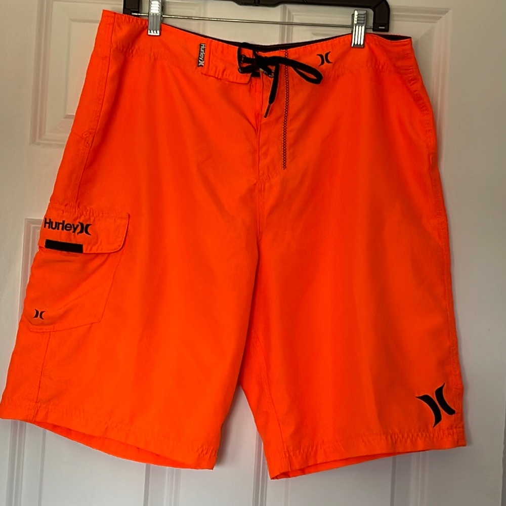 HURLEY BOARD SHORTS. Size 34. Bright orange w/black. VGUC/EUC.